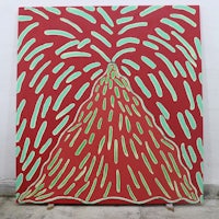a red and green painting on a wall